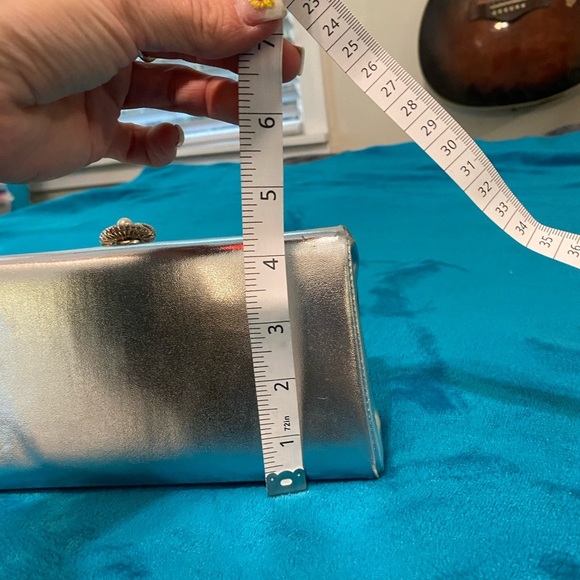 Chic Black Wristlet with Sleek Design and Metallic Accents - Picture 15 of 16